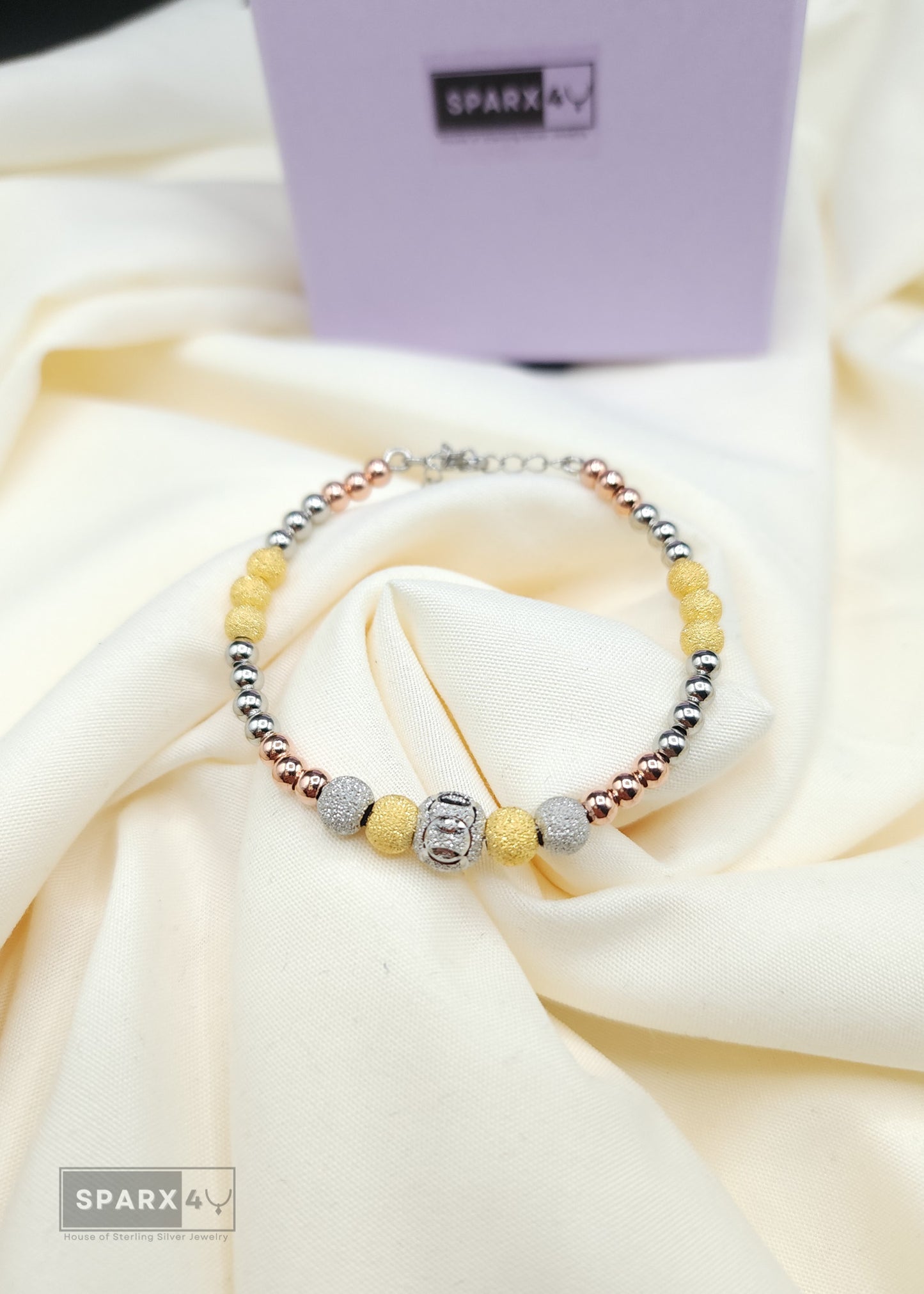 TRI-COLOR BEADED BRACET