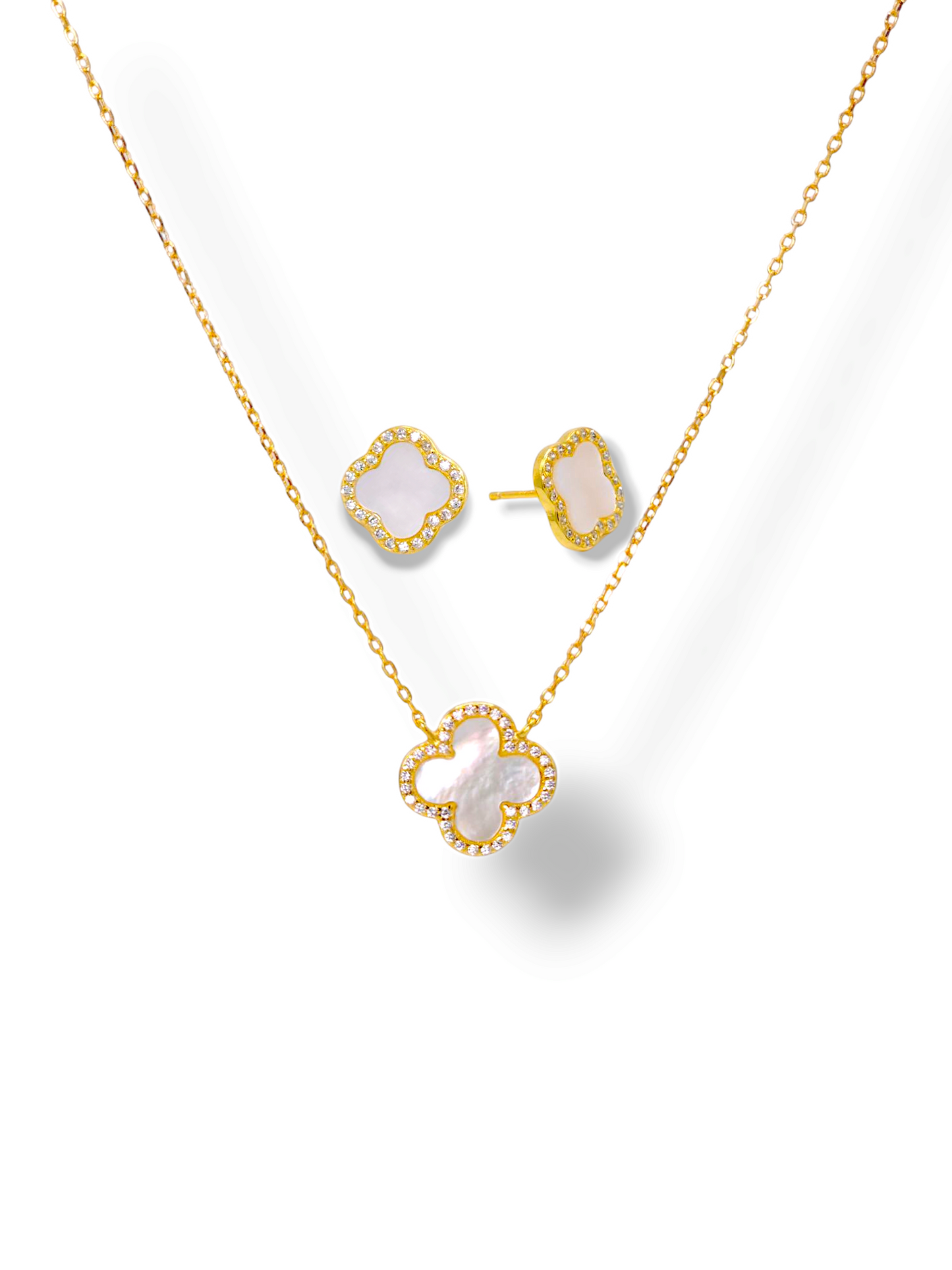 women silver necklace and earrings