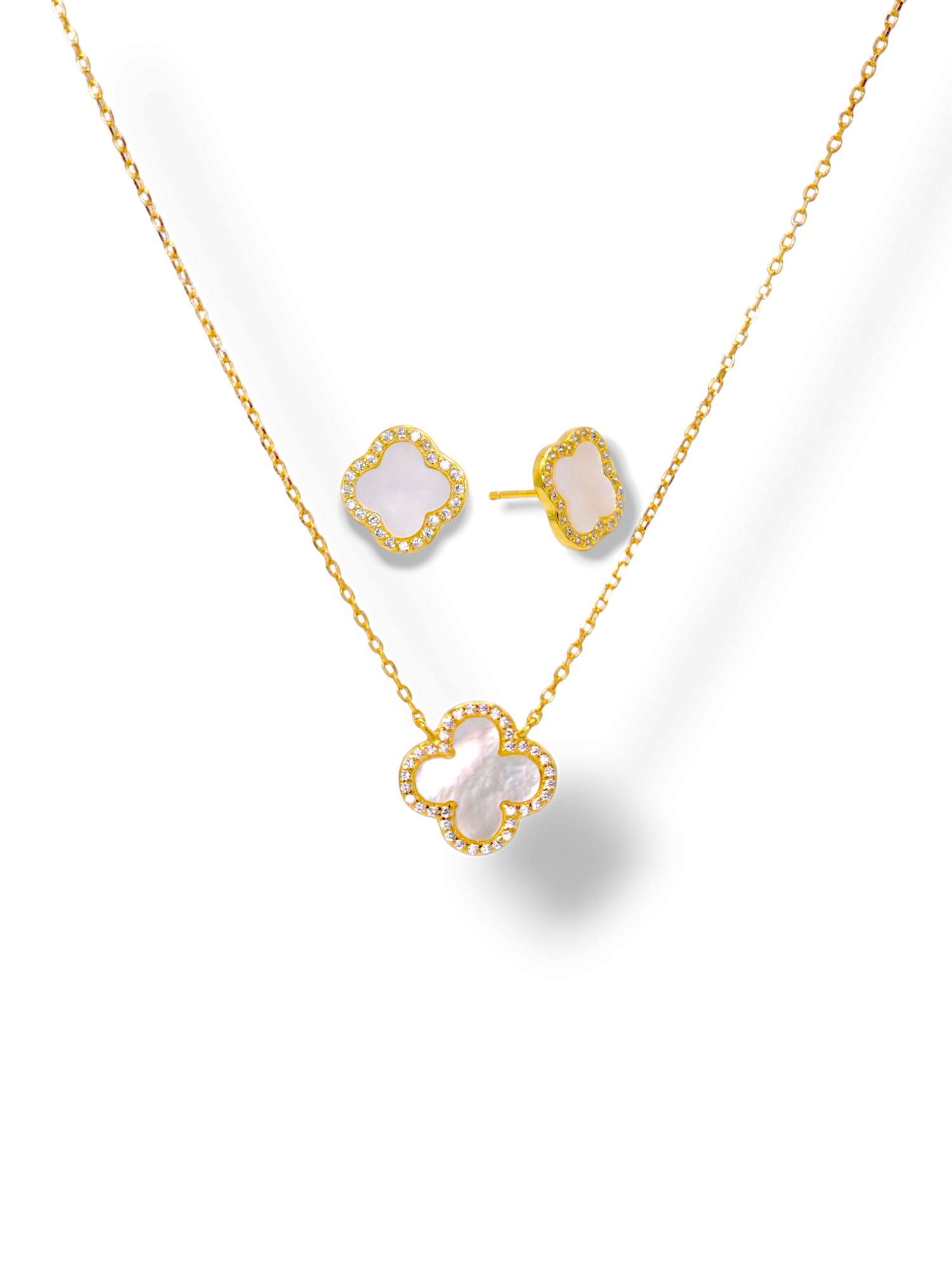 women silver necklace and earrings