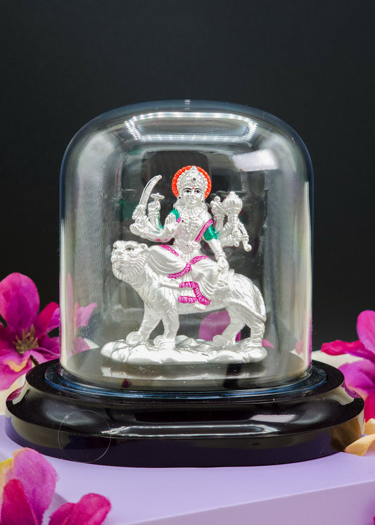 Silver Ambe Mata Idol in a glass dome