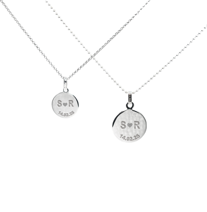 Couple silver pendant set