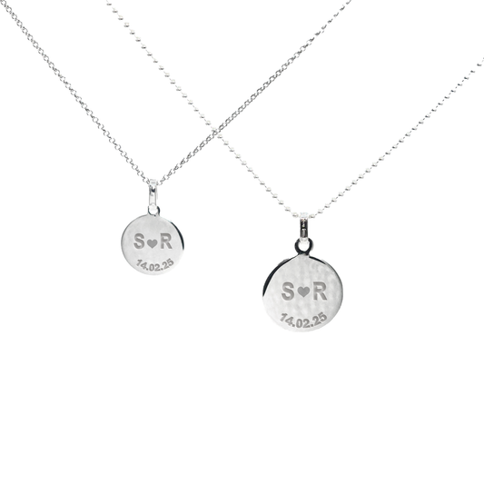 Couple silver pendant set