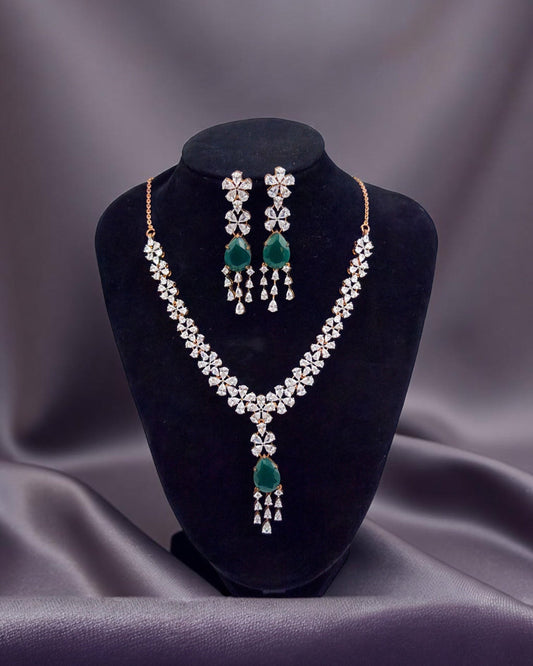 Bridal Jewelry set with necklace and earrings on a black velvet stand against a gray background