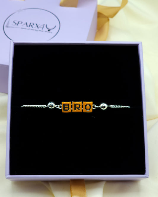 Silver rakhi bracelet with bro text