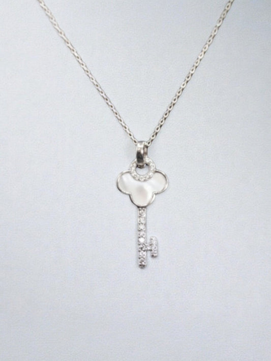 SPARX4U Mother of pearl key necklace with sterling silver chain and pave diamond accents.
