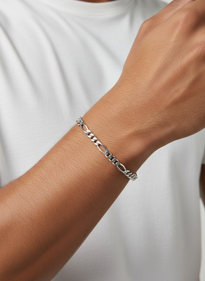 SPARX4U Sterling Silver Figaro bracelet with a classic link pattern. Elegant and lustrous.